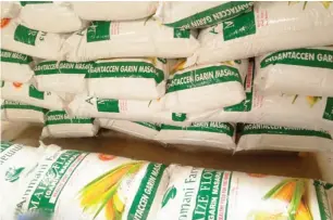  ??  ?? Bags of maize flour at Ammani Farms factory, Funtua