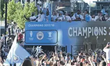  ?? AFP ?? Pep Guardiola has committed himself to Manchester City until 2021, just days after the club won the Premier League title