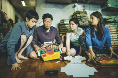  ?? NEON/CJ ENTERTAINM­ENT ?? The Kim family: Choi Woo-shik Choi, Song Kang-ho, Jang Hye-jin and Park So-dam, from left, in “Parasite.”