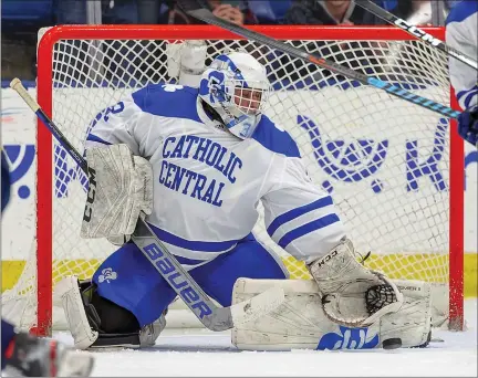  ?? TIMOTHY ARRICK — FOR MEDIANEWS GROUP ?? Detroit Catholic Central’s Luca Naurato with a save as the No. 1-ranked Shamrocks defeat the No. 2-ranked Hartland Eagles, 7-1, Wednesday, in Plymouth.