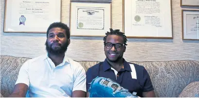  ?? JACQUELINE LARMA/THE ASSOCIATED PRESS ?? Rashon Nelson, left, and Donte Robinson were arrested by police while they were waiting for a third person at a Philadelph­ia Starbucks for a business meeting. Their arrests quickly went viral. “We do want to make sure it doesn’t happen to anybody again.”