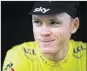  ?? GETTY IMAGES ?? Chris Froome borrowed a teammate’s bike and kept racing after a crash during the next-to-last stage Friday.