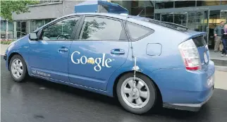  ?? KAREN BLEIER/AFP/GETTY IMAGES ?? This Google self-driving car is a Toyota Prius modified with a system that has video cameras inside and sensors at the front and on top of the vehicle.