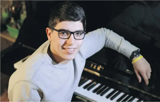  ?? J O H N K E N N E Y/ MO N T R E A L G A Z E T T E ?? Pianist Cyril Nader, 17, was presented with a Royal Conservato­ry of Music gold medal for scoring the highest marks in Level 2 piano in Quebec. He scored a near- perfect 95 per cent.