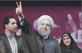  ?? Vahid Salemi Associated Press ?? IRANIAN President Hassan Rouhani faces a tight race for a second term despite being in the lead. Hard-liners worry his policies will undermine their power.