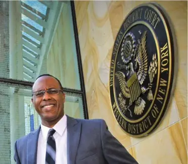  ?? ANDREW FRANCIS WALLACE/TORONTO STAR ?? Dr. Fitzgerald Anthony Hudson stands outside Federal Court in Buffalo on Wednesday. He faces Medicare fraud charges.