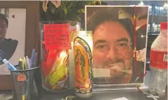  ?? LUIS SÁNCHEZ SATURNO/THE NEW MEXICAN ?? A jar containing condolence notes for the family of James Roybal sits Wednesday at the front desk at the Genoveva Chavez Community Center. Roybal died Sept. 11 after a heart attack and will be remembered Friday at a Chavez Center memorial.