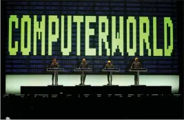  ?? JANE TYSKA — BAY AREA NEWS GROUP ?? Kraftwerk members Ralf Hutter, Henning Schmitz, Fritz Hilpert and Falk Grieffenha­gen, from left, perform at the Bill Graham Civic Auditorium in San Francisco on Wednesday.