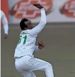  ?? AFP ?? Nauman Ali took five wickets for 86 runs in the second innings against Zimbabwe. —