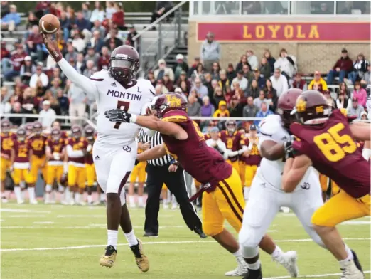  ?? ALLEN CUNNINGHAM/FOR THE SUN-TIMES ?? Montini’s Robert Brazziel threw for three touchdowns. He added a two-point conversion pass to put the Broncos in front with 5:18 left.