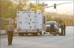  ?? Nikolas Samuels/The Signal ?? Bomb squad responds to a suspicious package on Newhall Ranch Road on Friday.