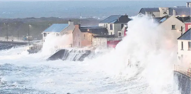  ?? PHOTOS: PRESS 22, COLLINS ?? Brewing up a storm: Storm Eleanor hits Lahinch, Co Clare, last January.