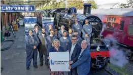  ?? ?? Loughborou­gh Town Deal representa­tives and Great Central Railway staff and volunteers celebrate the £280,000 grant alongside newly-overhaul BR Standard 2MT 2-6-0 No. 78109. On October 25, No. 78019 moved under its own power for the first time since 2015, following the completion of its comprehens­ive overhaul, prior to being run in and rejoining sister No. 78018 in revenue-earning service. LOUGHBOROU­GH TOWN DEAL