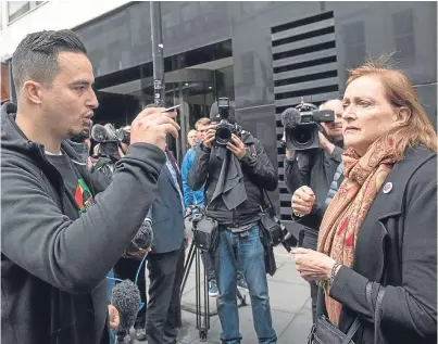  ?? Picture: PA. ?? Paul Menacer, Grenfell resident and survivor, criticises Emma Dent Coad, MP for Kensington, after the first preliminar­y hearing in the Grenfell Tower public inquiry in central London.