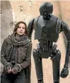  ??  ?? Felicity Jones, here with an imperial droid, star in Rogue One: A Star Wars Story.