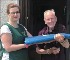  ??  ?? Michael Fleming, Kanturk taking a delivery from Ann of the Duhallow Community Laundry service.