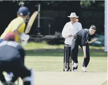  ??  ?? Boldon bowler Sam Bringham in action. Picture by Frank Reid