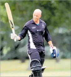  ??  ?? CHB batsman James Mackie salutes a century in a stand of 101 not out at a Hawke’s Bay Premier mens cricket knock out final between Central Hawke’s Bay and Napier Tech, at the Ongaonga cricket ground in December 2012.