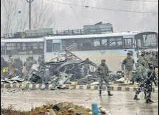  ?? WASEEM ANDRABI/HT FILE ?? Security forces at the site of the Pulwama terror attack on February 14, 2019, in Srinagar.