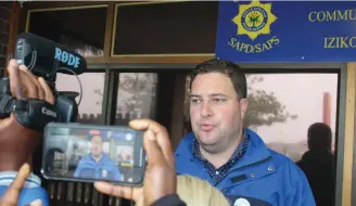  ?? Photo: Michelle Pienaar ?? George DA Constituen­cy Head, Geordin Hill-Lewis: “I’m proud of the DA caucus for being so strong in this stressful time.” He addressed the media at George police station last week prior to laying criminal charges against Naik.