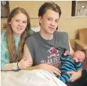  ?? VIA ISLAND HEALTH ?? Paige Playford and Bryce Taylor of Nanaimo had the Island’s first baby of 2018, Chase Luca Taylor.