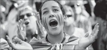  ?? AFP ?? A young woman reacts outside the Catalan parliament in Barcelona on Friday, during a plenary session to debate a motion on declaring independen­ce from Spain.