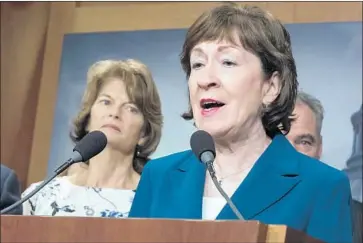  ?? J. Scott Applewhite Associated Press ?? SENS. SUSAN COLLINS, right, and Lisa Murkowski, who both favor abortion rights, are among the Republican­s whom Democrats could court for potential support in the brewing battlegrou­nd over Roe vs. Wade.