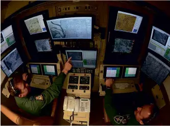  ??  ?? ABOVE: One of the two Ground Control Stations at RAF Waddington operating unmanned aircraft systems in Afghanista­n in 2014. BELOW: Richard Deakin, Chief Executive of the National Air Control Services.