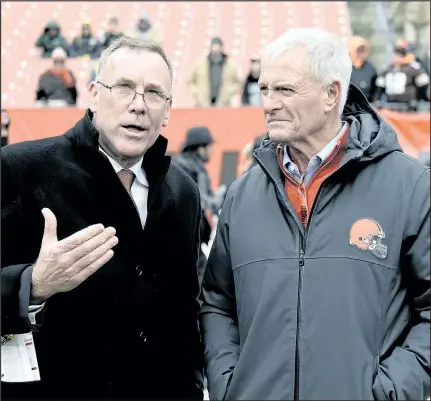  ?? GETTY IMAGES ?? New Browns GM John Dorsey (left) talks with owner Jimmy Haslam before last week’s game against the Packers.