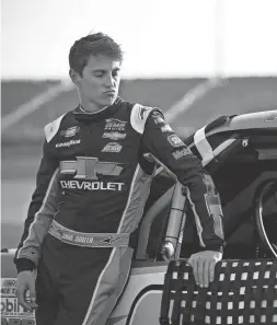  ?? NELLES/TENNESSEAN.COM VIA IMAGN CONTENT SERVICES, LLC
ANDREW ?? NASCAR Truck Series driver Zane Smith waits by his truck before a race at Nashville Superspeed­way in Lebanon, Tenn., on June 18.