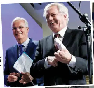  ??  ?? Tensions: EU chief negotiator Michel Barnier and David Davis