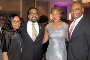  ??  ?? Kimberly and Ryan Davis with Kristi Smith and her husband, Greg Smith, attend the 25th annual Ivy Ball in February. Kristi Smith says the thing she now realizes about her husband since social distancing is “that he has to be doing something, and that’s OK.”