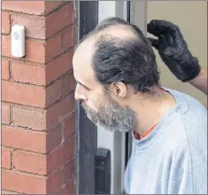  ?? CP PHOTO ?? Matthew Vincent Raymond, charged with four counts of first-degree murder, heads from provincial court in Fredericto­n on Monday.