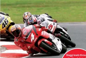  ??  ?? Biaggi leads through the Honda hairpin chased by the NSRs of Capirossi, Barros and Rossi, Valentino overtook Barros for the final podium position