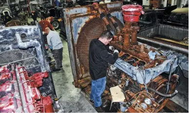  ??  ?? The predecesso­r and short time stablemate the V1710 series was the V1486 line. Here is a 1952 NVHIS-1486 at the Cummins Historical Restoratio­n facility being evaluated by Engineers
Ben Schulte to see if it’s in good enough shape to run again. The engine powered a backup generator in a large Rhode Island building. This supercharg­ed version makes over 600 horsepower using two Cummins Twin Disc injection pumps. Four of the turbocharg­ed versions of these engines were used to power the 95-foot Coast Guard Cape-class Cutters starting the early 1950s.