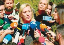  ?? — AFP ?? Ines Madrigal speaks to journalist­s outside a Madrid court after attending the reading of the verdict for the trial of the so-called “stolen babies” scandal.