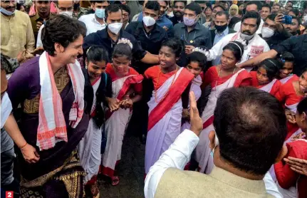  ??  ?? 2. DANCE, DANCE
Priyanka Gandhi with party supporters in Lakhimpur district, Assam, Mar. 1