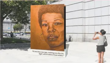  ?? Lava Thomas ?? Artist Lava Thomas designed this sculpture “Portrait of a Phenomenal Woman.”