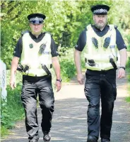 ??  ?? Cops on patrol Linwood Community Police Officers PC Brian Dick and PC Martin Norwood in May after the third attack