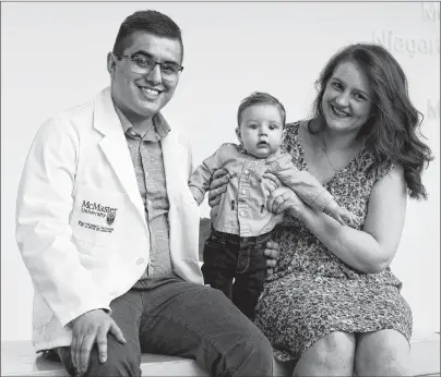  ?? SUBMITTED PHOTO/BOB TYMCZYSZYN ?? Dr. Carl Marshall, his partner, Timika, and their son, Asher, at the Niagara Regional Campus of McMaster’s Michael G. DeGroote School of Medicine.