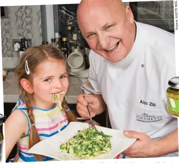  ?? NEEL Picture: ?? Greens: Aldo tucks into his pasta with Rosie