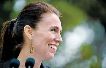  ?? SAEED KHAN/GETTY-AFP ?? New Zealand leader Jacinda Ardern says she celebrated her win by heading home and eating a “pot of noodles.”