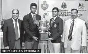  ??  ?? PIC BY KUSHAN PATHIRAJA Dr. Harsha Alles, Chairman, Gateway College, Aaron Fonseka, Captain, Gateway College, Heshan Meethalawa, Captain, Royal College, B. A. Abeyratne, Principal, Royal College posing with the Alles – Gunasekara Trophy