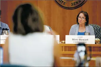  ?? LUIS SÁNCHEZ SATURNO/New Mexican file photo ?? Sen. Mimi Stewart, D-Albuquerqu­e, listens during a hearing at the Capitol in 2018.