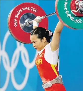  ?? Získala na olympiádě v Pekingu zlato v kategorii do 48 kg, o medaili však kvůli dopingu přišla FOTO ČTK/ AP ?? Čchen Sie-sia