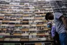  ?? Isaac Lawrence/AFP/Getty Images ?? Dozens of air conditioni­ng units adorn a block of flats in Hong Kong. The heat air con gives out and the energy it uses are at odds with our aspiration­s on climate. Photograph: