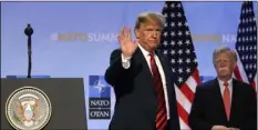  ??  ?? U.S. President Donald Trump waves when leaving a press conference after a summit of heads of state and government at NATO headquarte­rs in Brussels, Belgium, on Thursday. AP Photo/olIVIer MAtthys