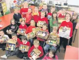  ??  ?? In 2011: Primary 4 pupils at Dalintober Primary School were thinking of others when they made up food boxes for the Salvation Army Food Parcel Appeal.