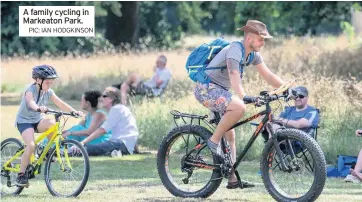  ??  ?? PIC: IAN HODGKINSON A family cycling in Markeaton Park.