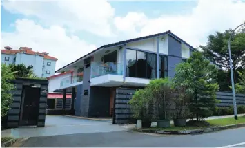  ?? ERA ?? This detached house on Tamarind Road, which sits on a 9,599 sq ft plot, was put up for auction with a guide price of $7.4 million or $842 psf on the land area